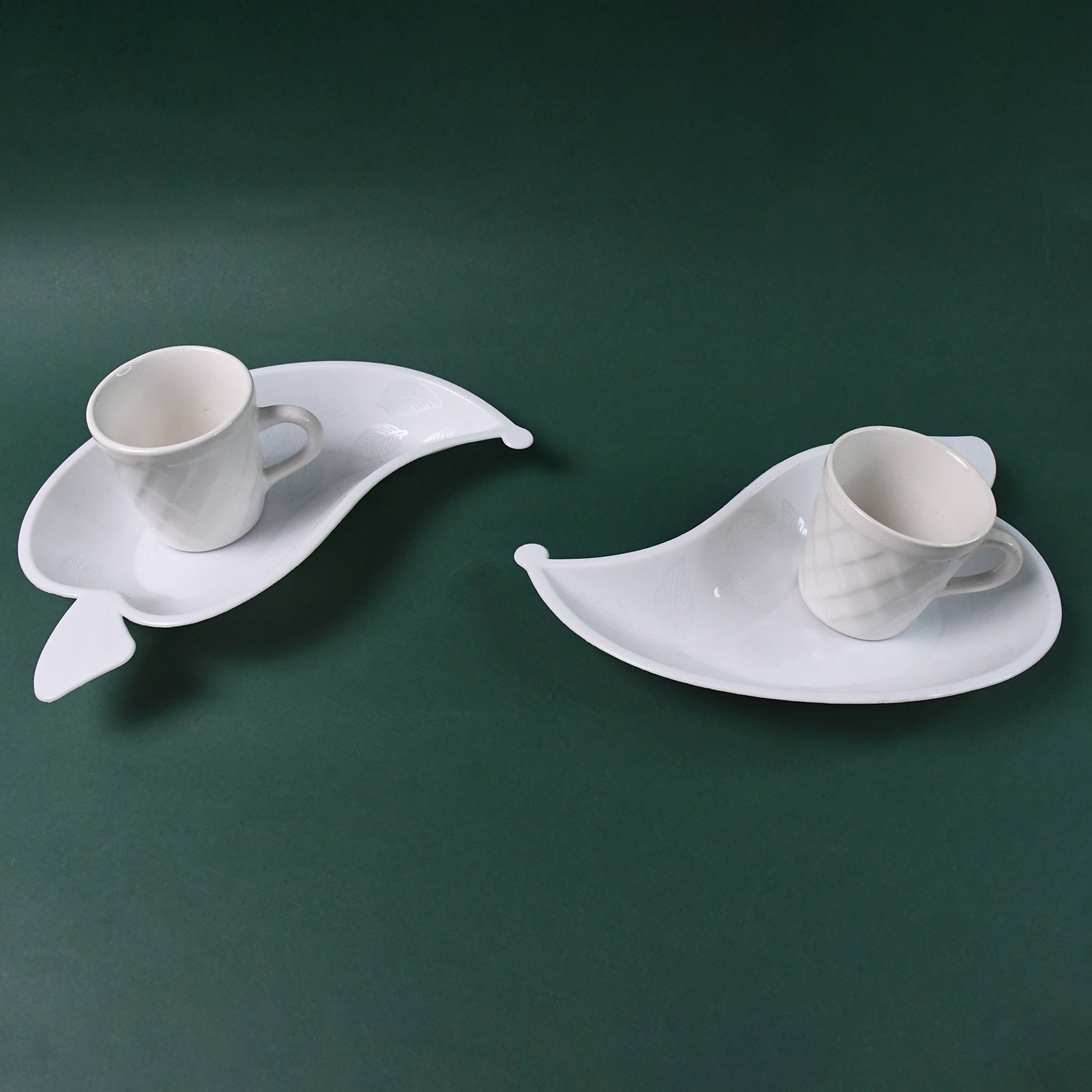 Unibic Ceramic Tea Cups With Plastic Leaf Shape tray / Platter (6 Pcs Set) Unibic Ceramic Tea Cups With Plastic Leaf Shape tray / Platter (6 Pcs Set)